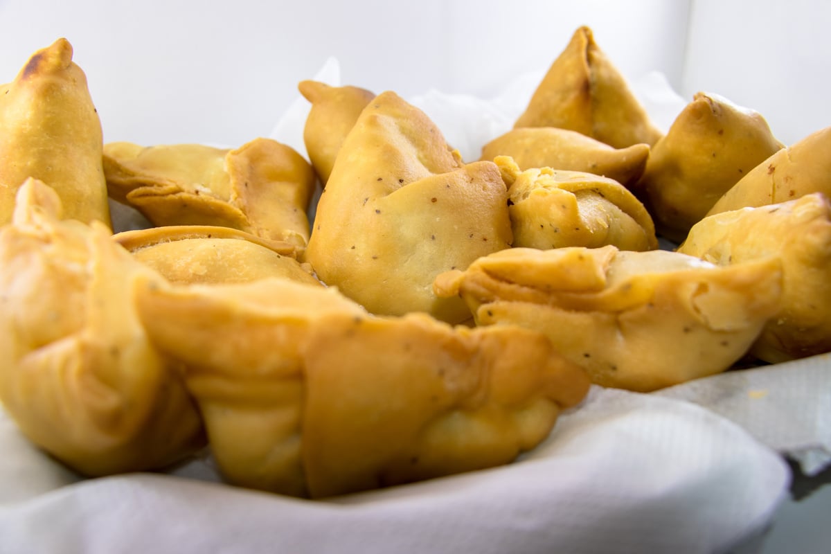 Vegetarian samosas filled with potato and green pea.Indian special traditional street food